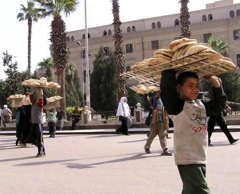 Boy selling bread in the Khan-el-Khalili bazaar