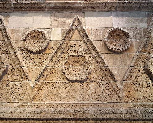 Decorated facade of the Palace of Mshatta (Jordan) at the Pergamon Museum in Berlin