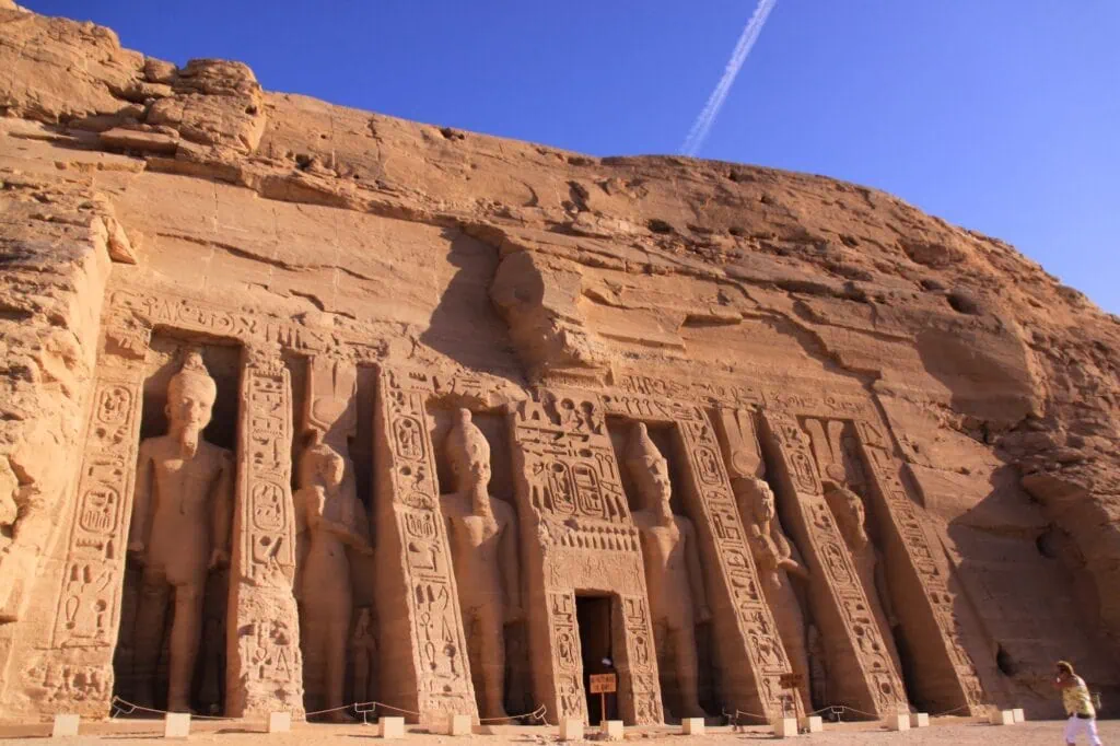 Rock-cut façade with standing statues at the Temple of Queen Nefertari, Abu Simbel