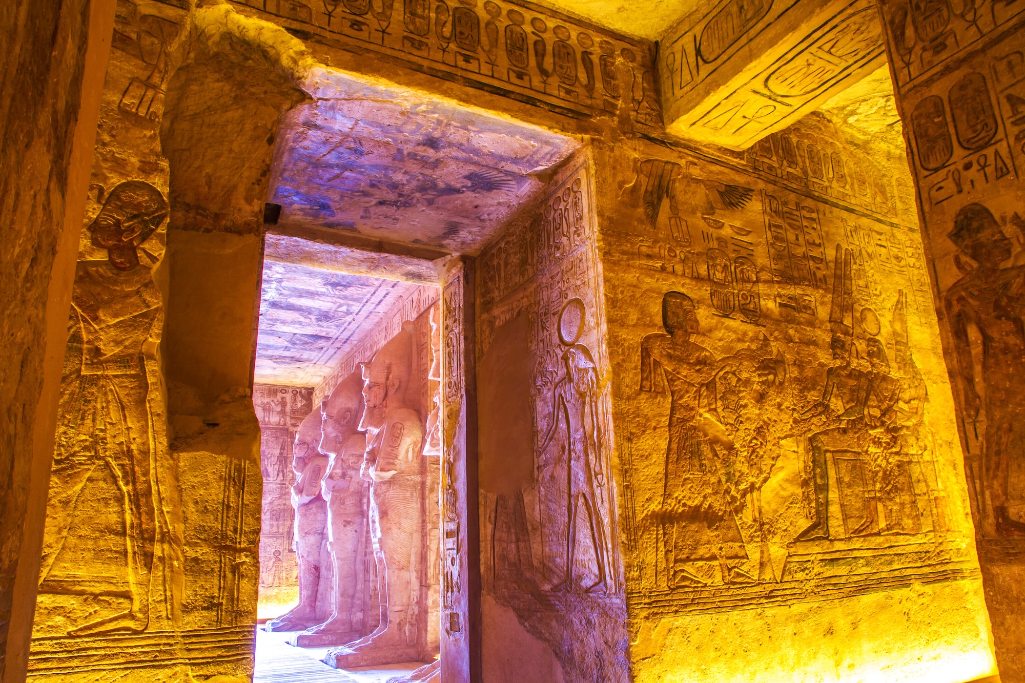Interior of Abu Simbel Temple with hieroglyphic carvings and ancient stone columns