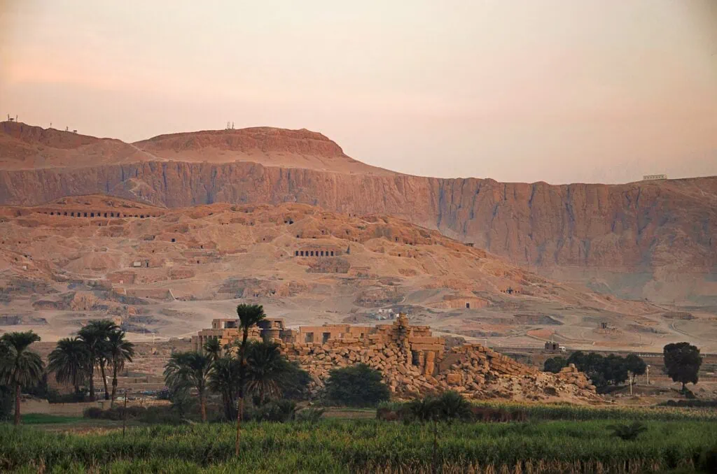 Aerial view of rock-cut tombs and desert hillside at the Tombs of the Nobles, Luxor