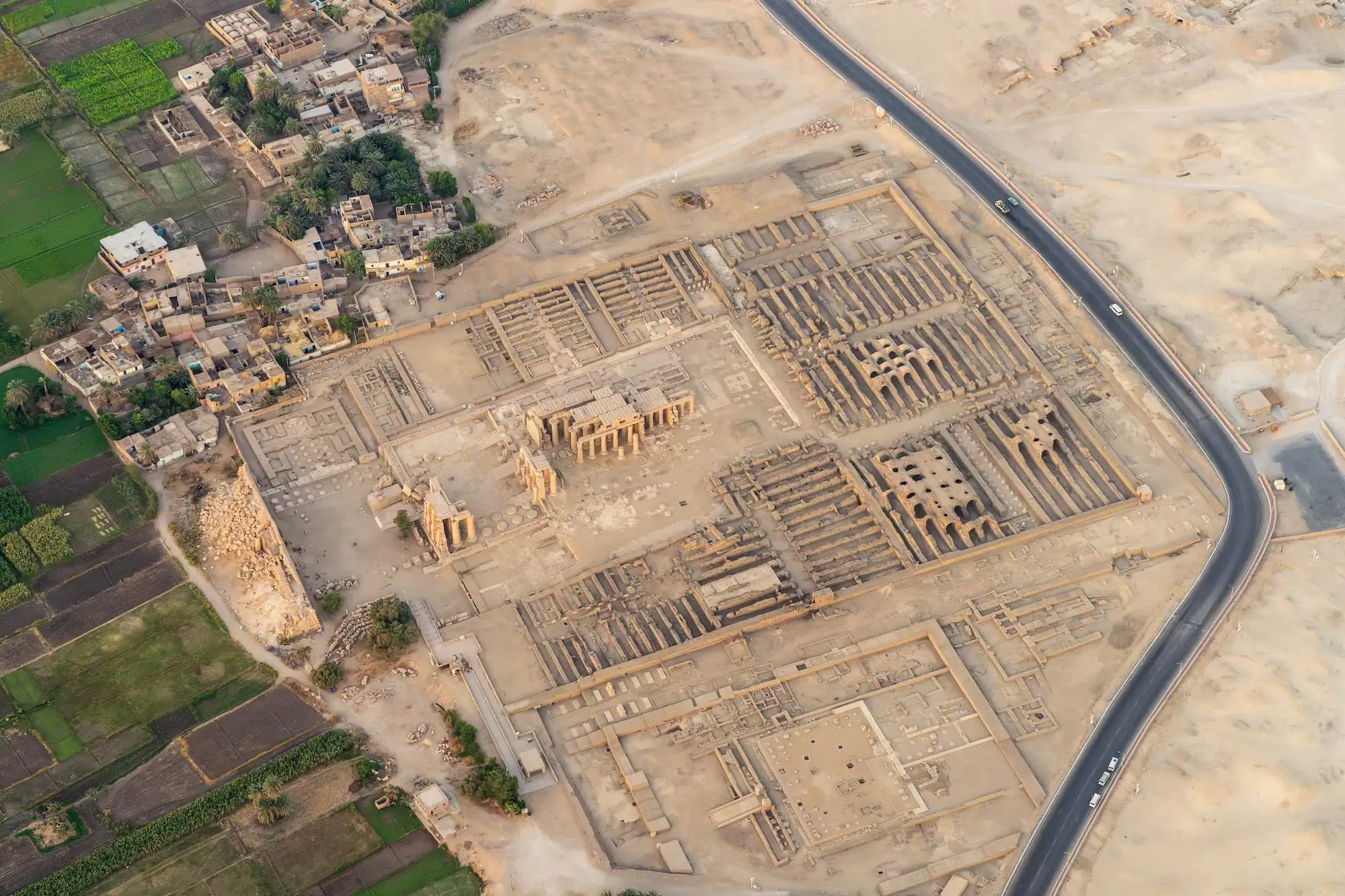 Aerial view of ancient Ramesseum temple complex ruins showing extensive archaeological foundations