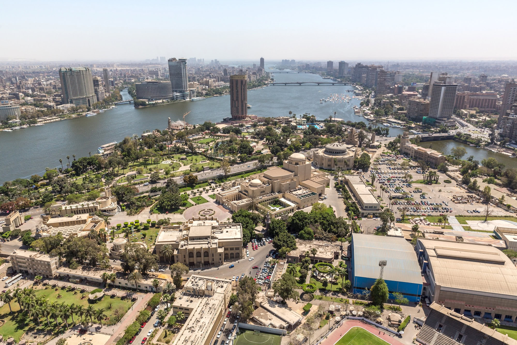 Aerial view of Gezira Island showing Cairo Opera House, Nile River, bridges and surrounding cityscape