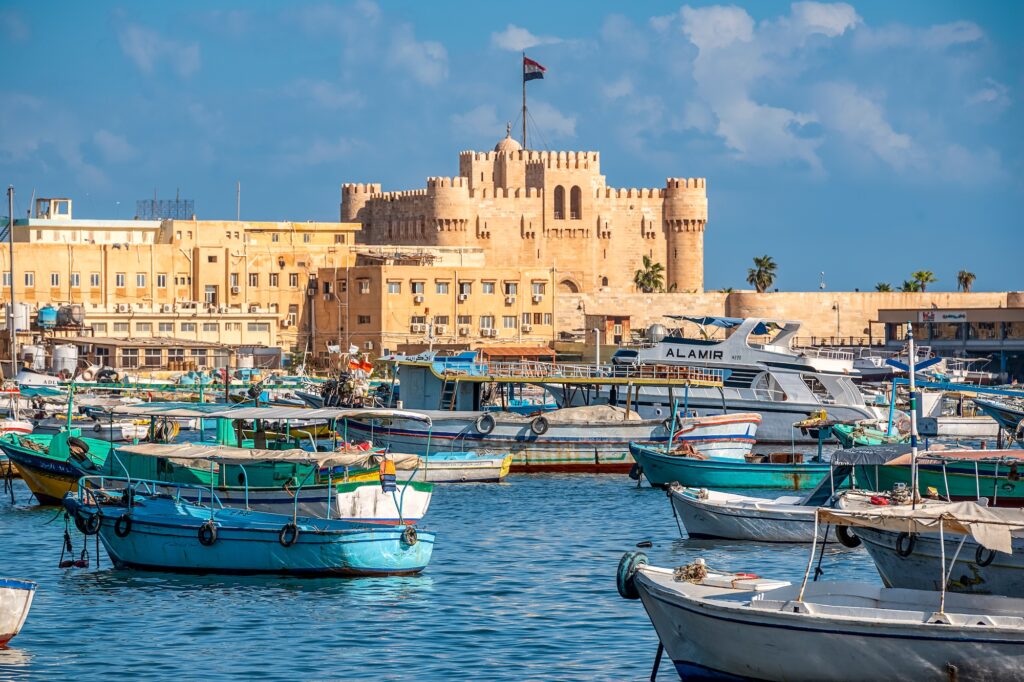 Alexandria Harbour with boats near Qaitbay Fort at the site of the ancient lighthouse, Alexandria