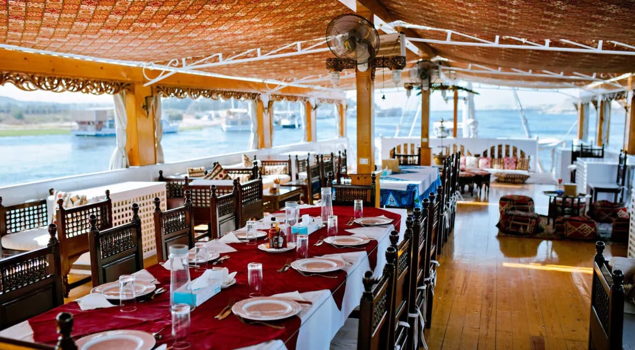 Outdoor dining setup on MS Amoura Dahabiya deck