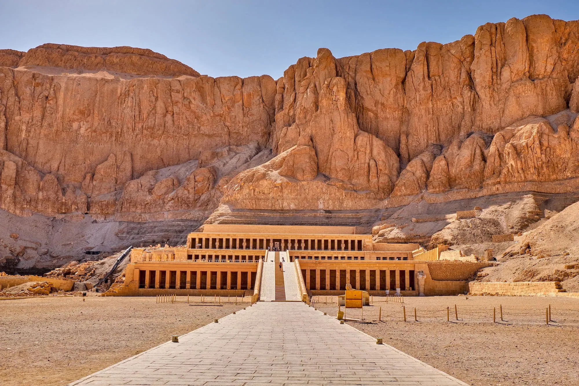 Temple of Queen Hatshepsut with limestone cliffs and columned terraces in Luxor's West Bank
