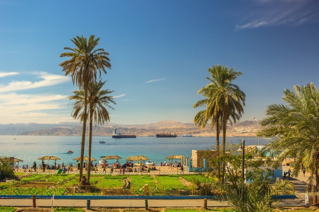 Aqaba waterfront park with palm trees and views of the Red Sea bay, Aqaba
