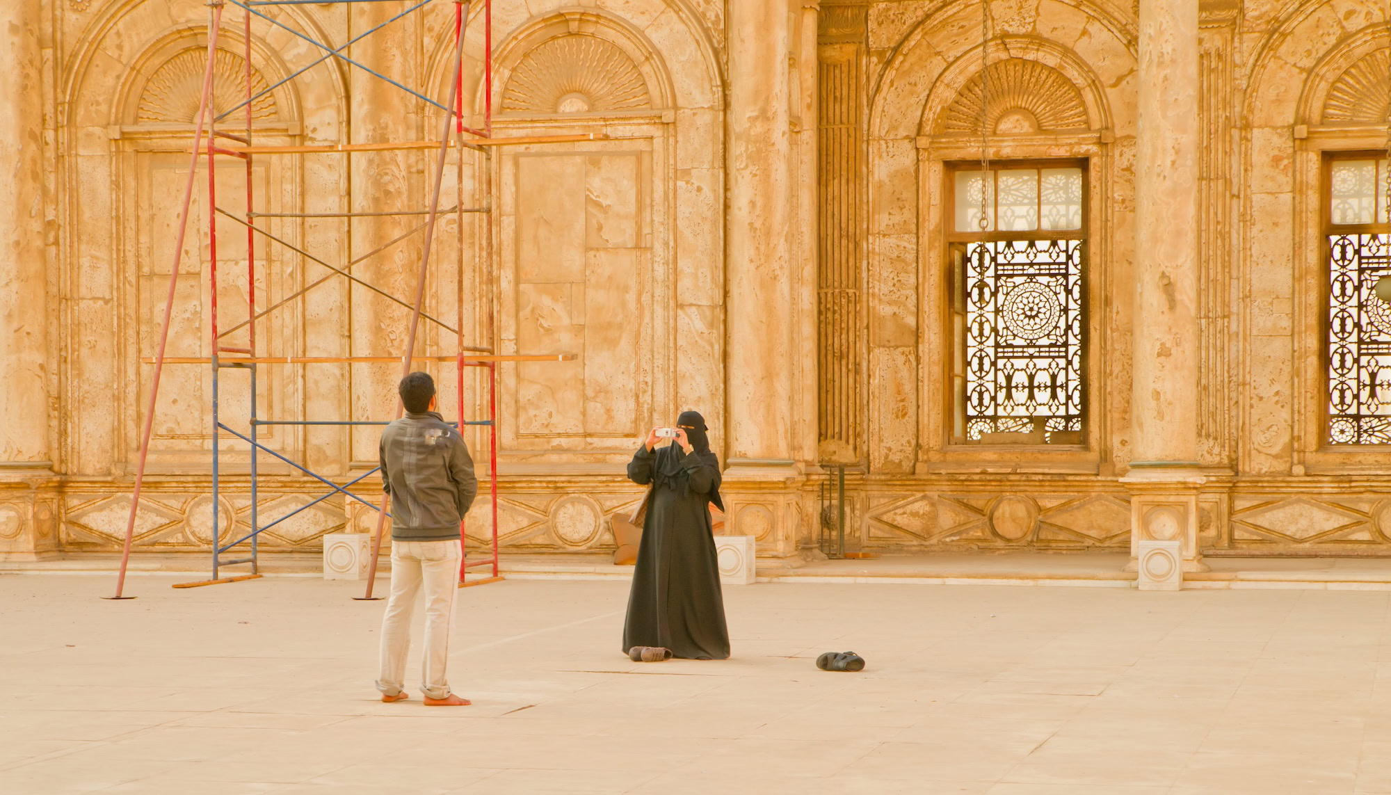 Islamic mosque courtyard with arches and columns in Middle East