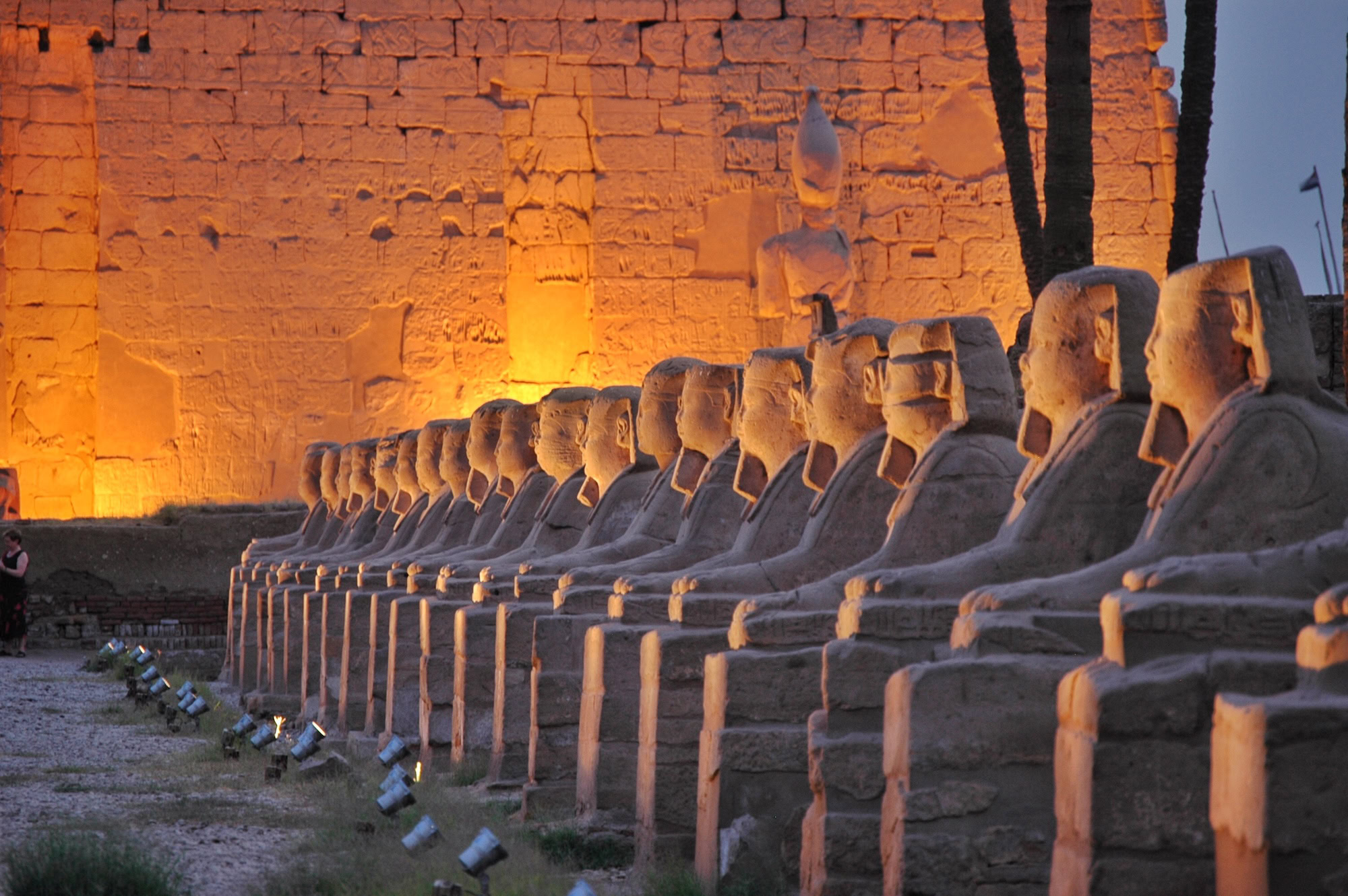 Ram-headed sphinx statues along ceremonial avenue at Karnak Temple, Egypt