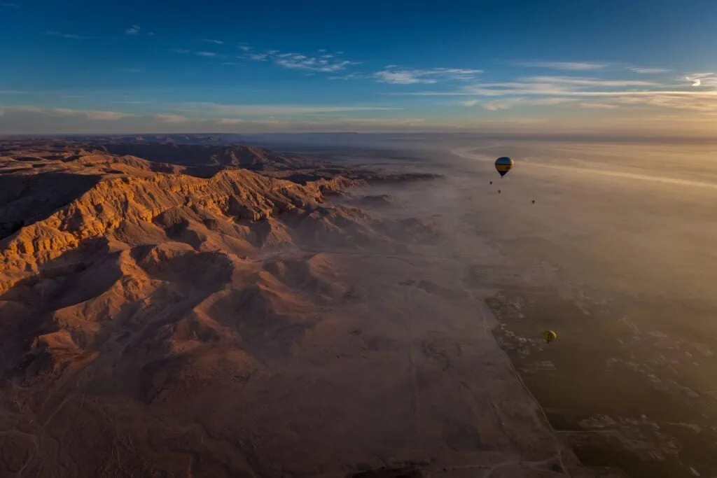 Aerial view of the Valley of the Kings with desert hills at sunrise, Luxor