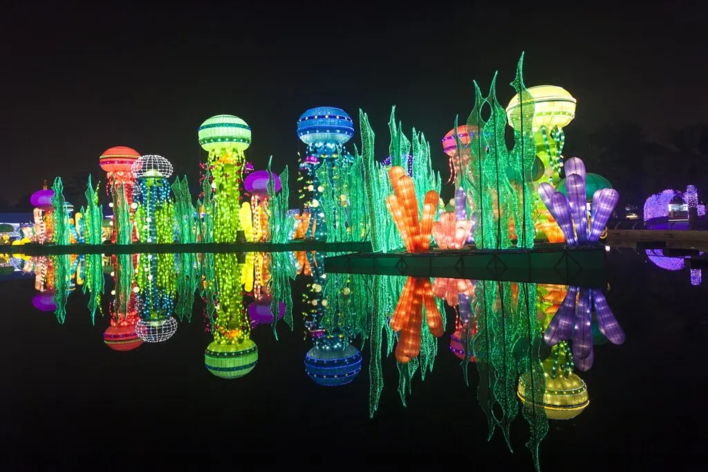 Illuminated themed light installations and sculptures at Dubai Garden Glow at night, Dubai