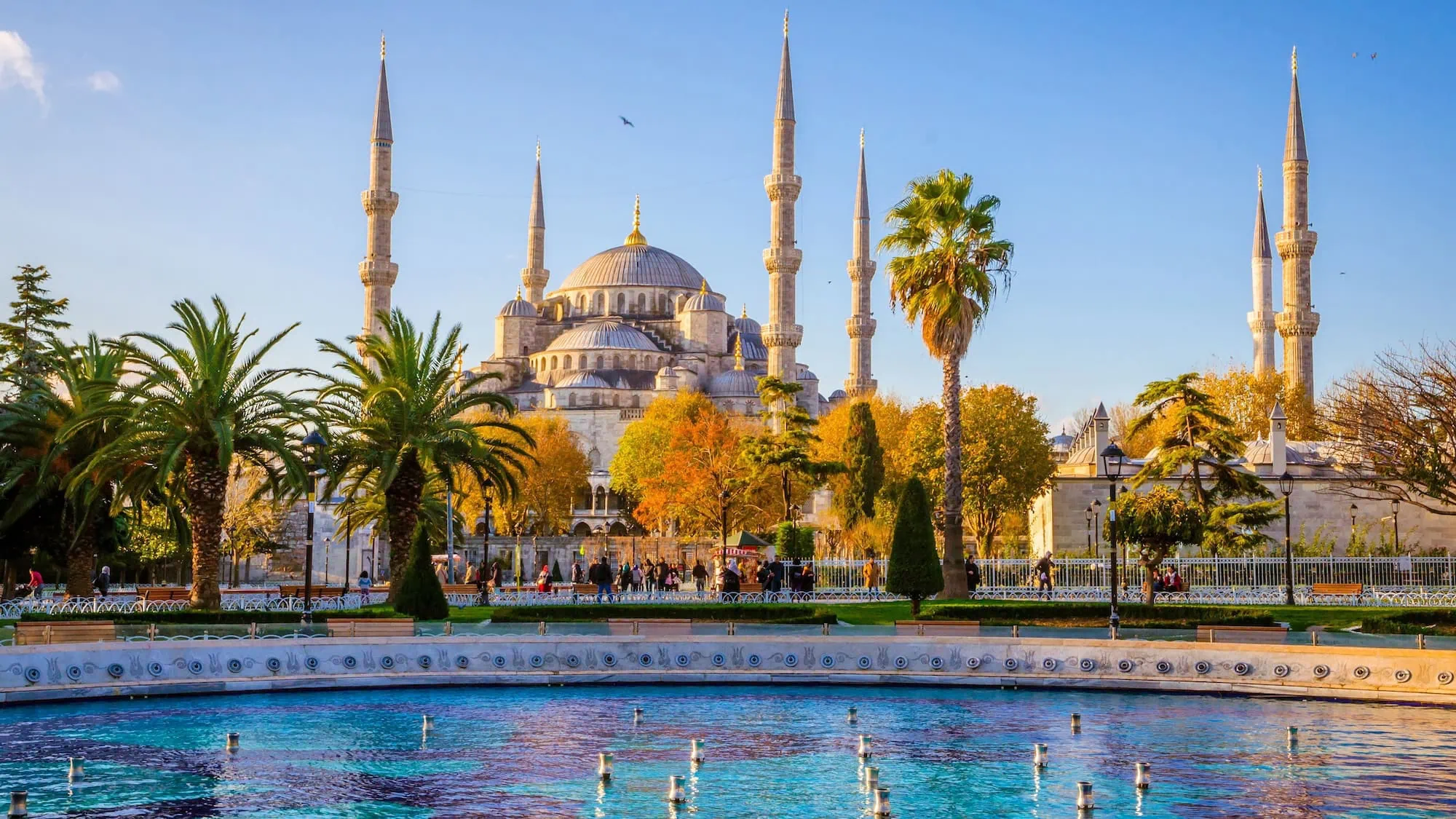 Blue Mosque with six minarets and central dome viewed from courtyard fountain