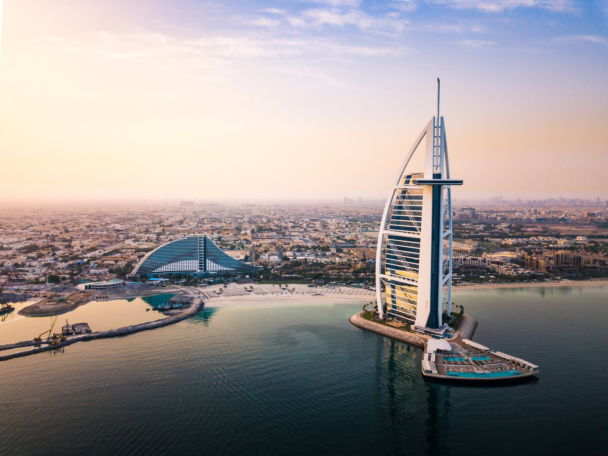Aerial view of Burj Al Arab hotel on artificial island in Dubai
