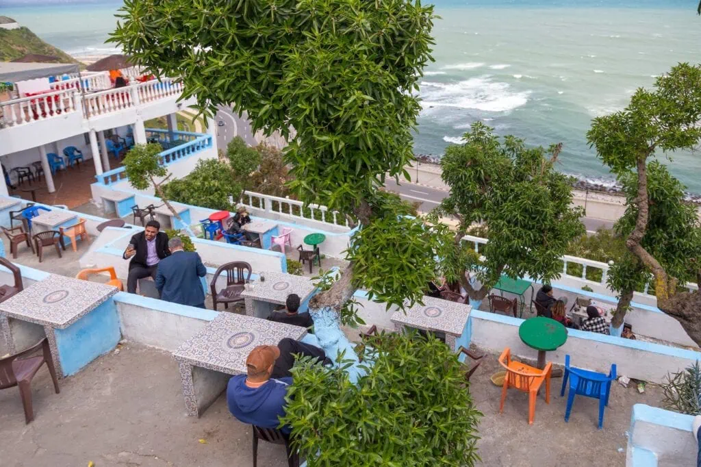 Cafe Hafa terrace with tables overlooking the bay and Strait of Gibraltar, Tangier