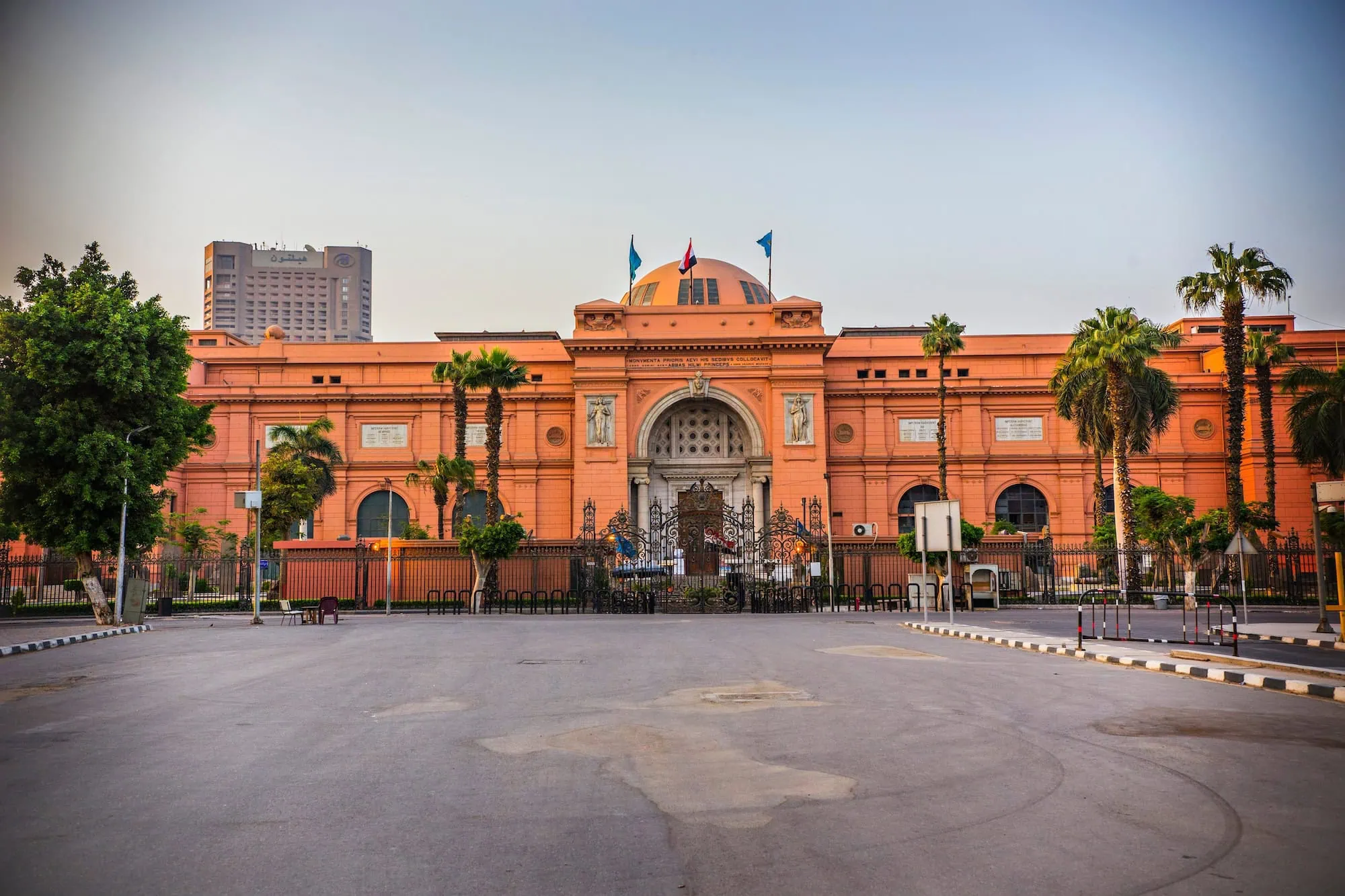 Exterior view of the Egyptian Museum in Cairo with distinctive pink sandstone facade