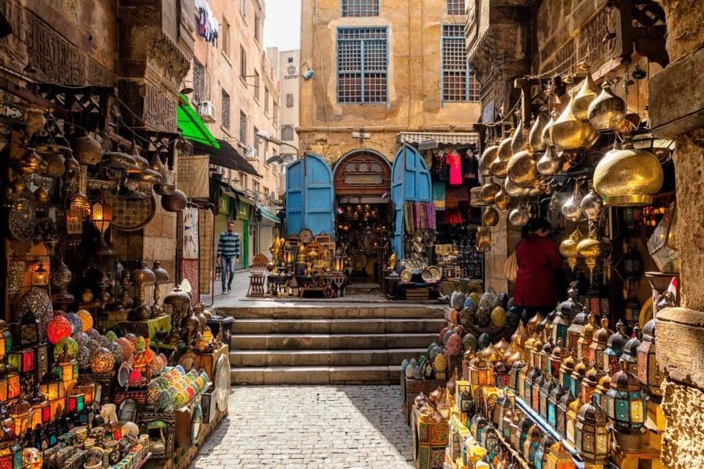 Interior view of a lantern shop displaying hanging metal and glass lamps in the Khan el-Khalili market, Khan el-Khalili, Cairo