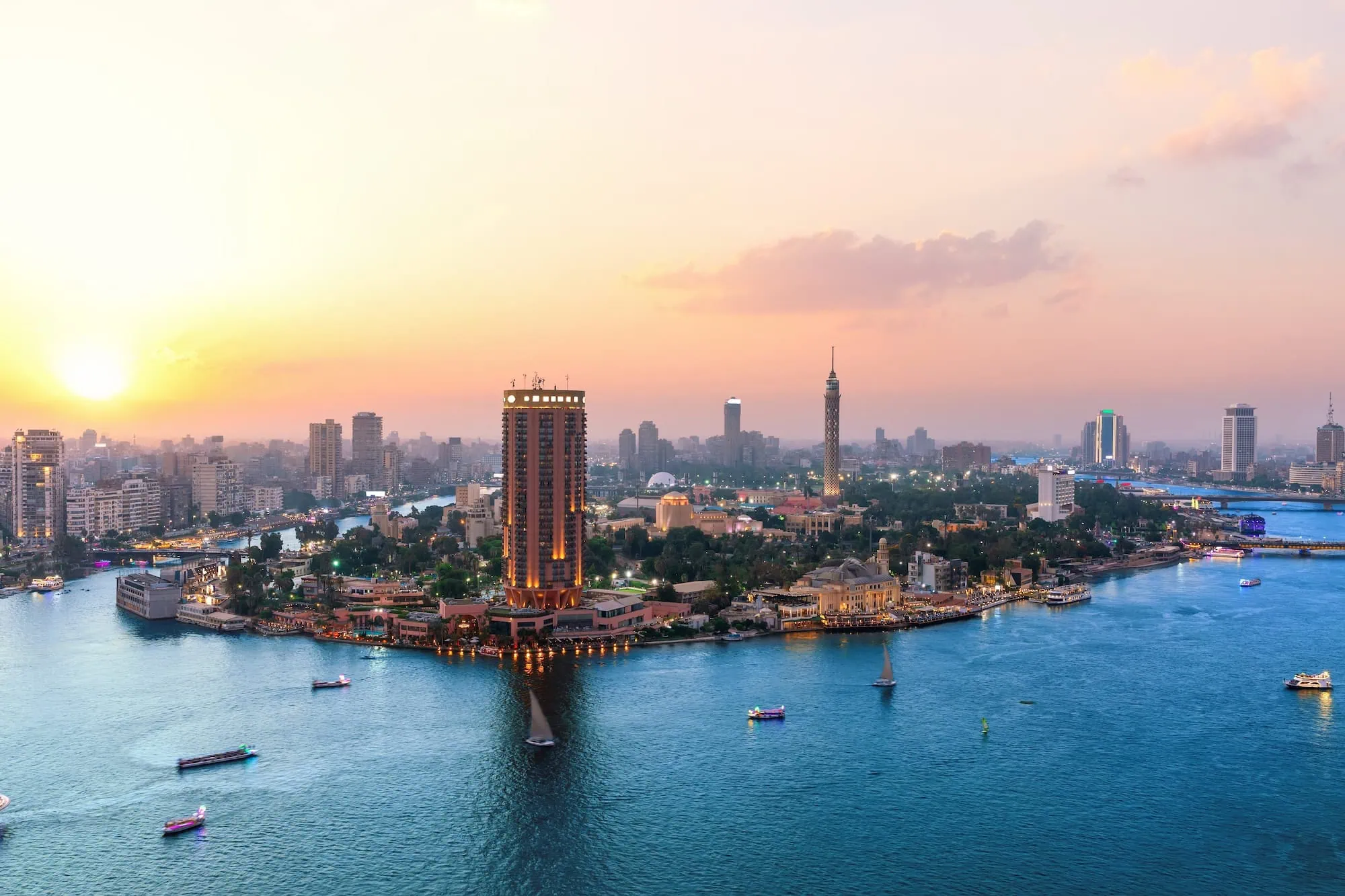 Cairo skyline with Cairo Tower and Nile River at sunset