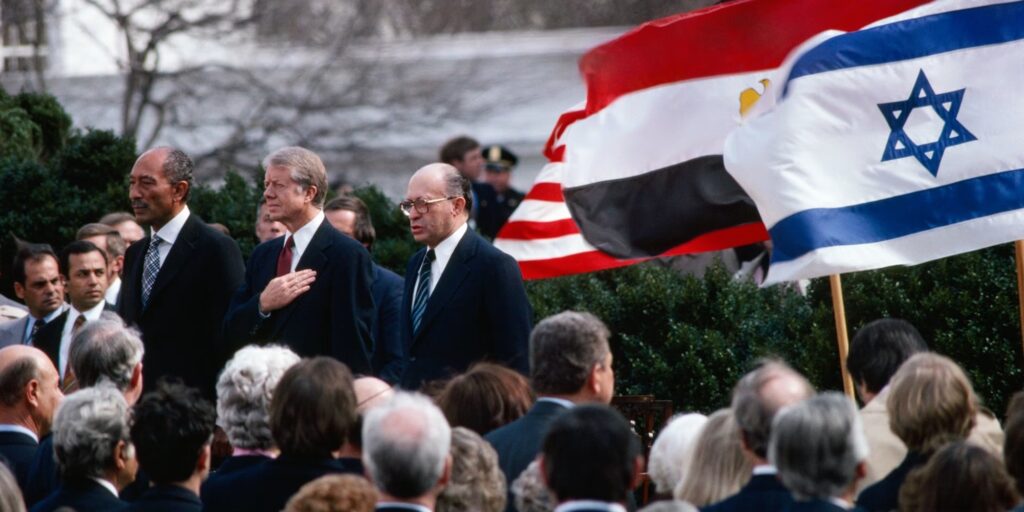 Leaders standing together during the signing ceremony of the Camp David Accords on the White House lawn, White House, Washington D.C.