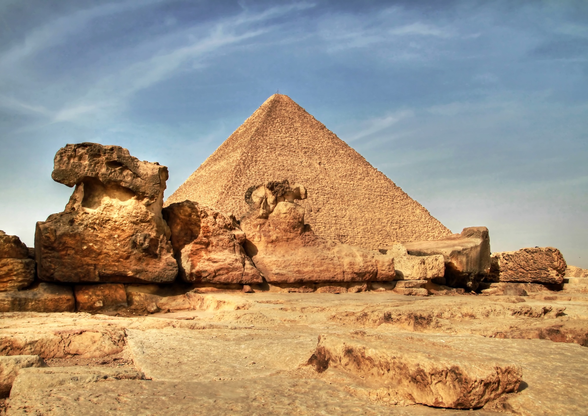 The Great Pyramid of Giza showing ancient limestone blocks and majestic desert landscape