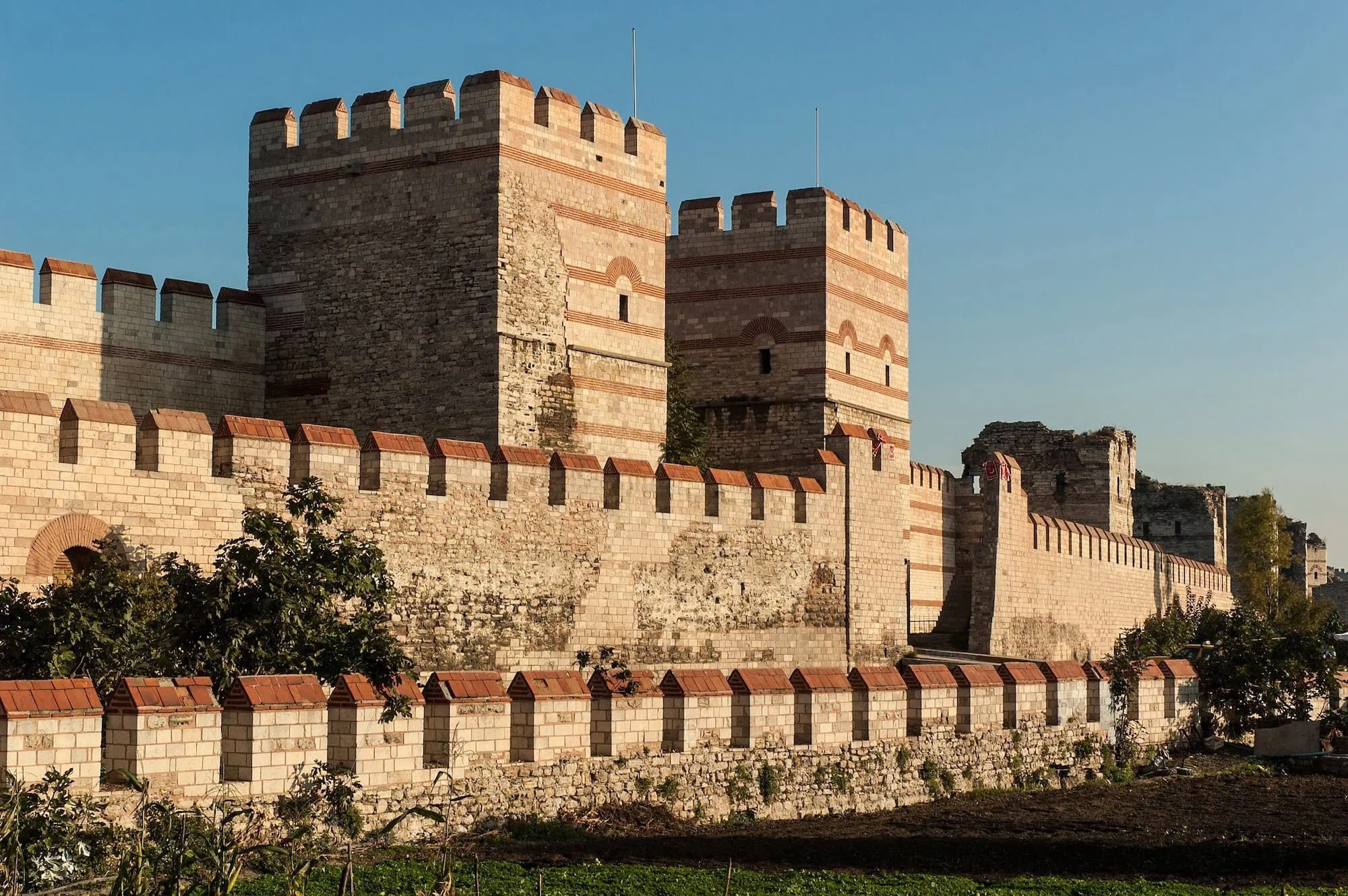 Ancient stone fortification walls of Istanbul showing defensive towers and crenellated battlements