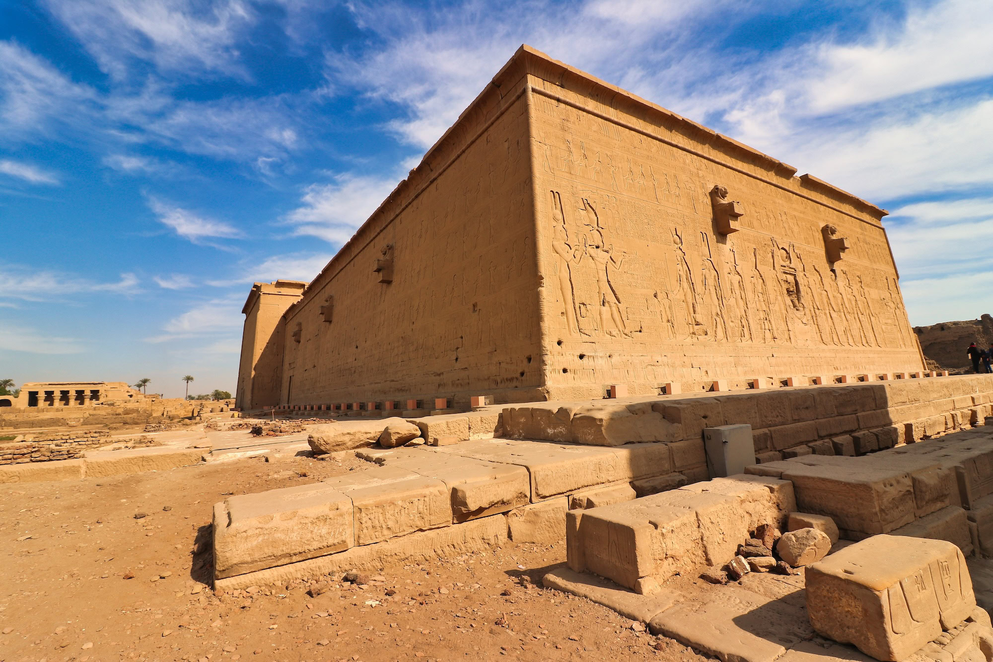 Well-preserved ancient Egyptian Temple of Horus at Edfu with detailed hieroglyphic reliefs and stone walls
