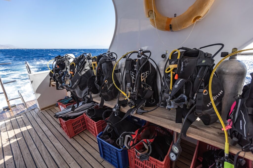 Diving equipment assembled on the deck of a boat before a dive in the Red Sea, Sharm el Sheikh