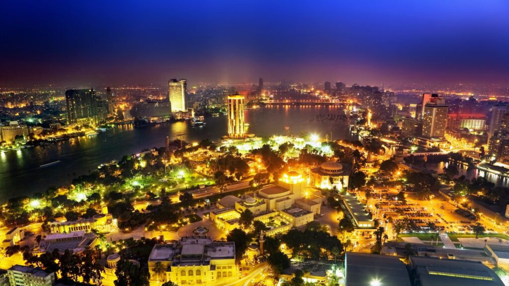 Panoramic cityscape of dense buildings and the Nile River seen from the Cairo Tower observation deck, Cairo