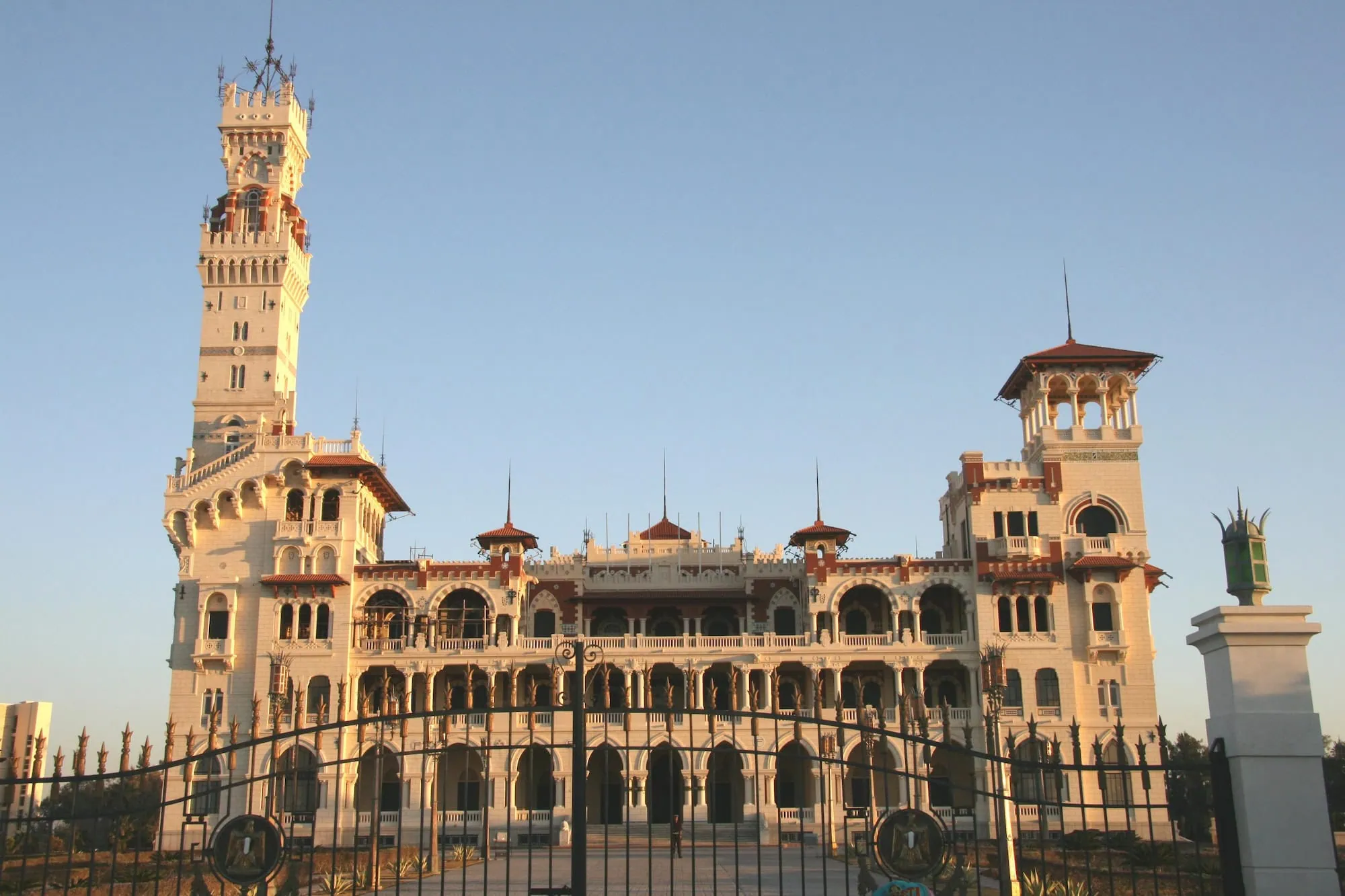 Montaza Palace complex showcasing ornate Islamic architecture with towers, domes, arches and courtyard