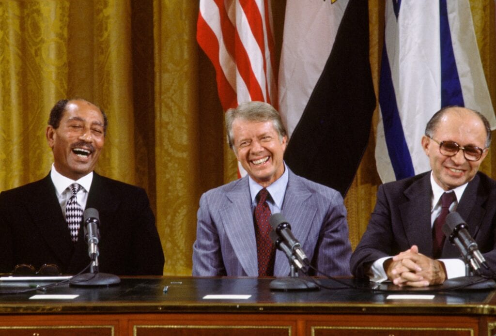 Leaders seated together during the signing ceremony of the Camp David Accords in the East Room, White House, Washington D.C.