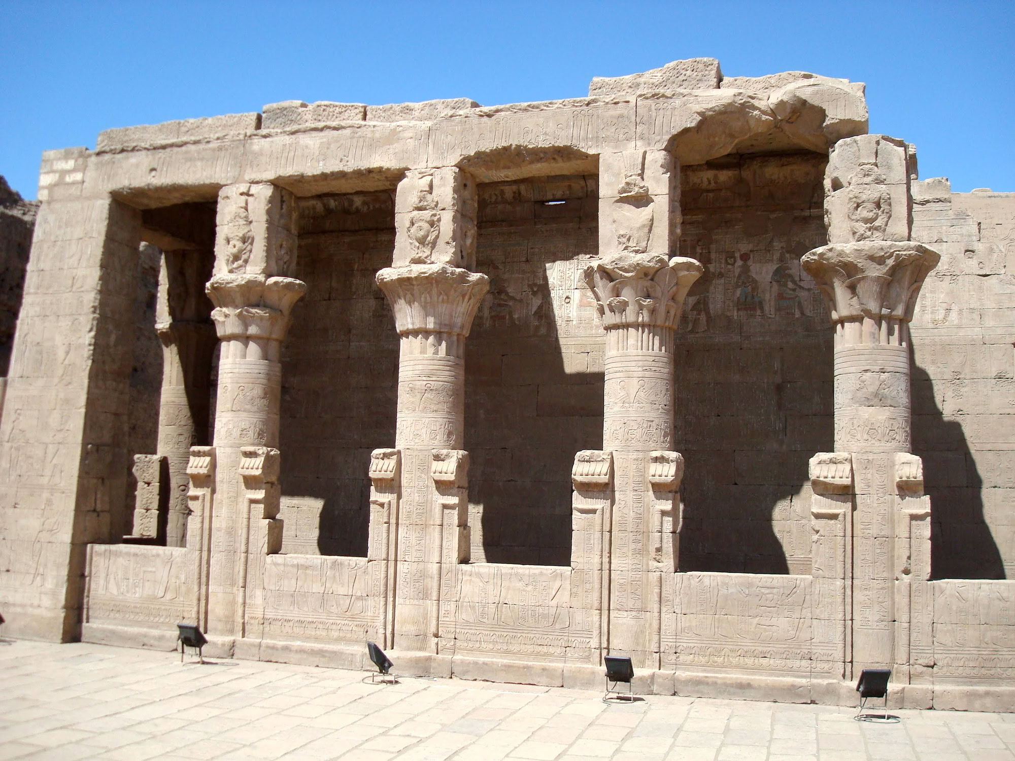 Ancient columns and hieroglyphic carvings at the Temple of Horus in Edfu, Egypt