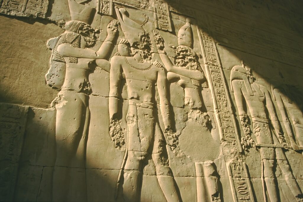 Bas-reliefs of crowned pharaoh at Kom Ombo Temple