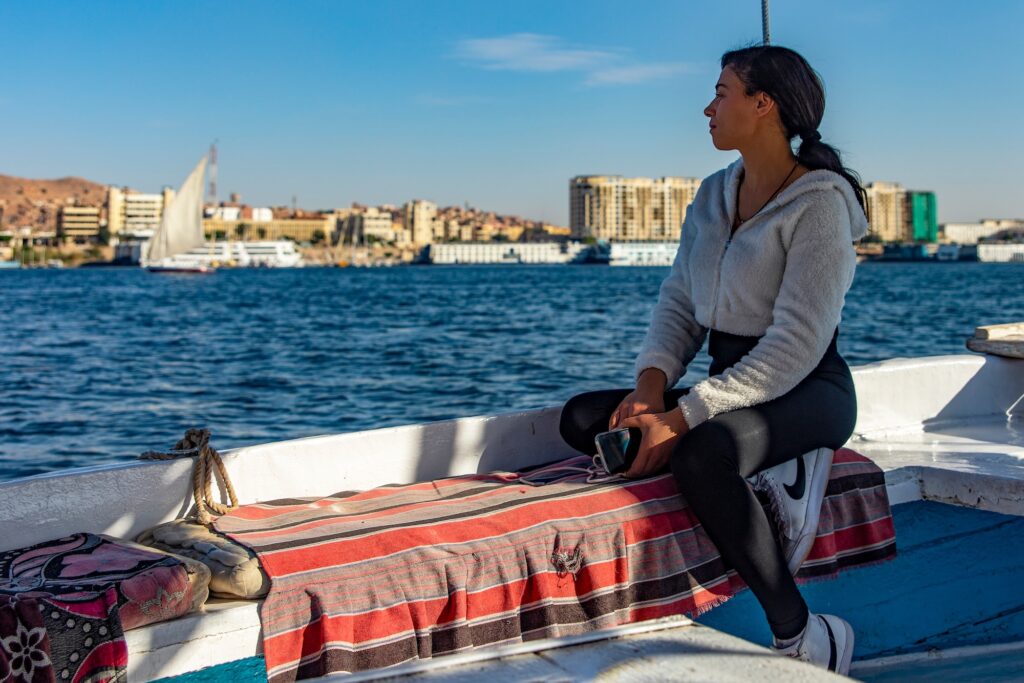 Felucca sailing on the Nile with scenic pharaonic views