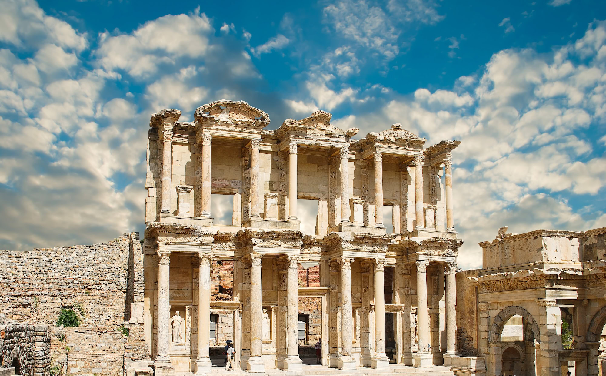 Ancient Library of Celsus facade with Roman columns and carved statues in Ephesus, Turkey