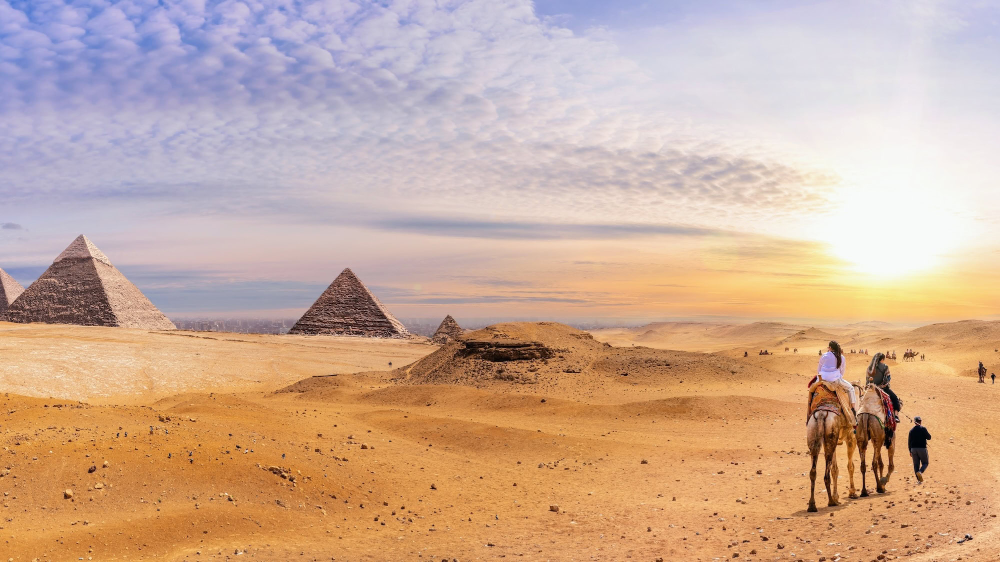 Famous Egypt Pyramids in the desert beautiful scenery with bedouins and camels Giza Cairo