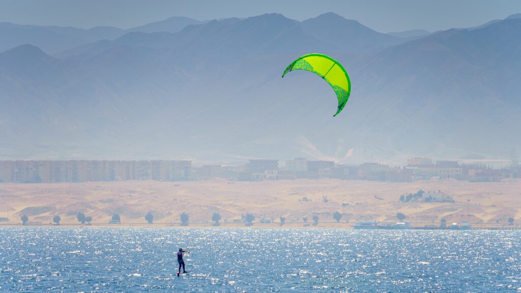 Daytime panoramic shot of a kite surfer on the Red Sea