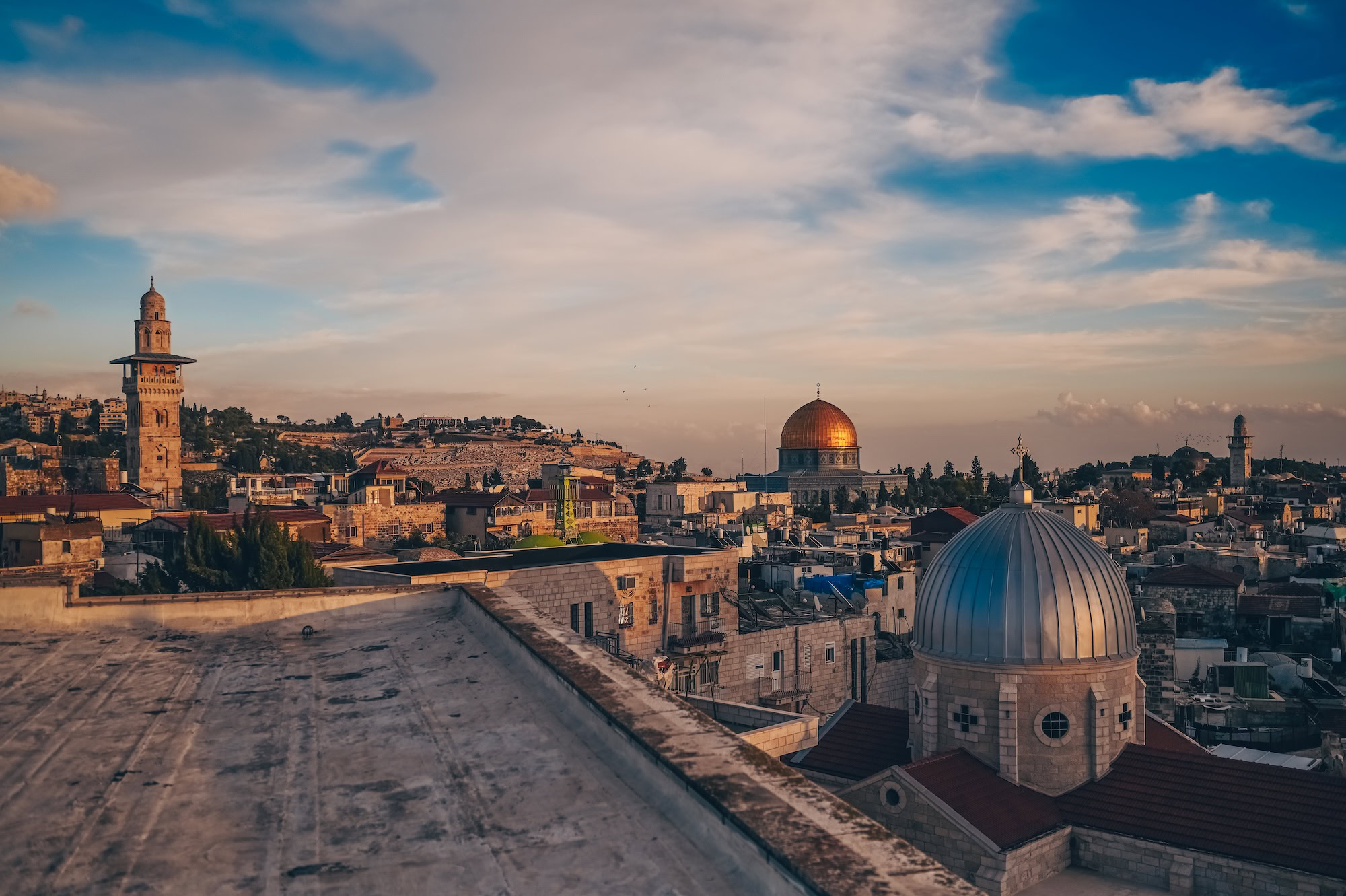 Jerusalem Capital of Israel. Beautiful panoramic view of the Old City at sunset Tomb of the Prophets and Dome of the Rock typical stoned houses