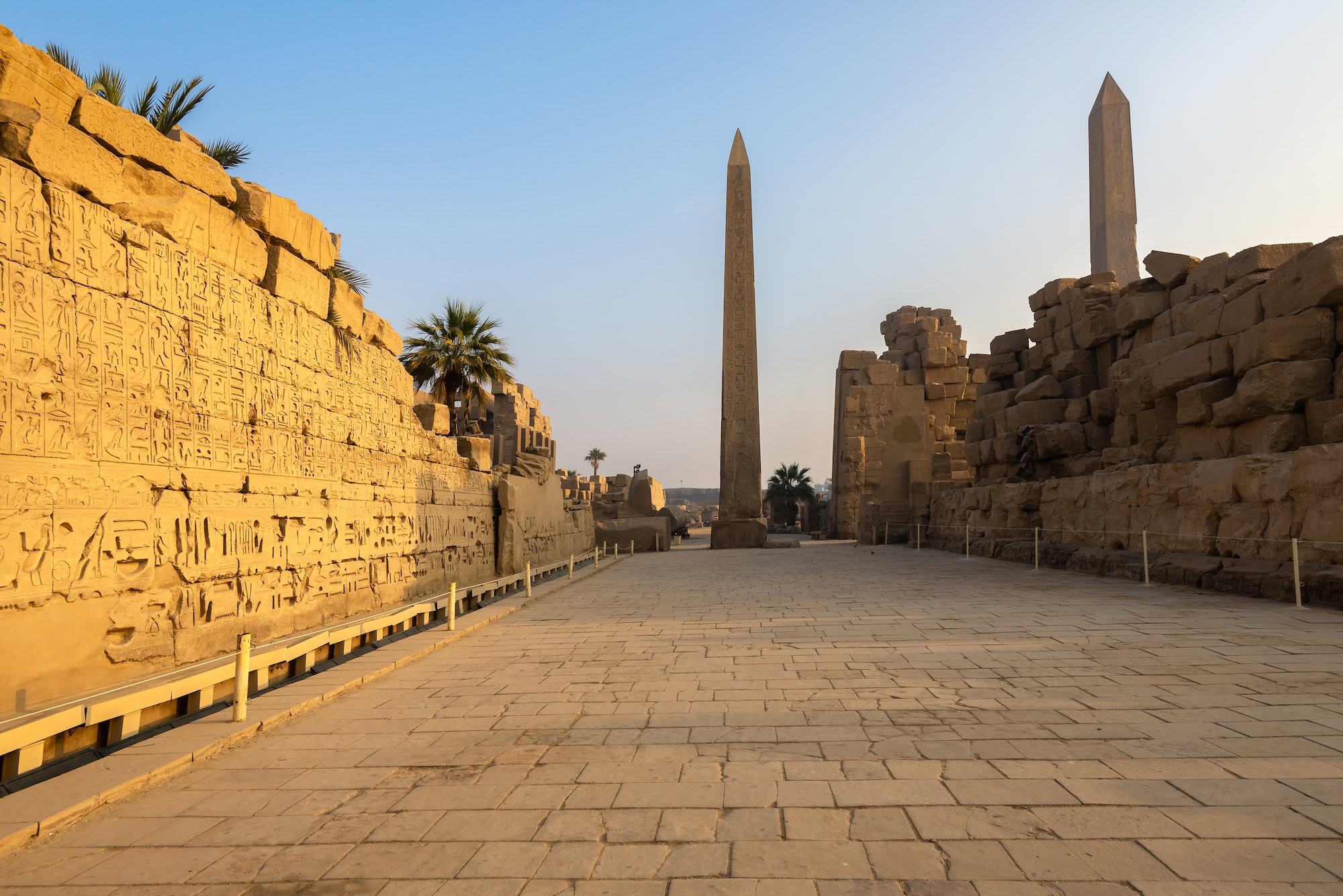 Ancient obelisks and hieroglyph-carved walls at Karnak Temple Complex in Luxor, Egypt