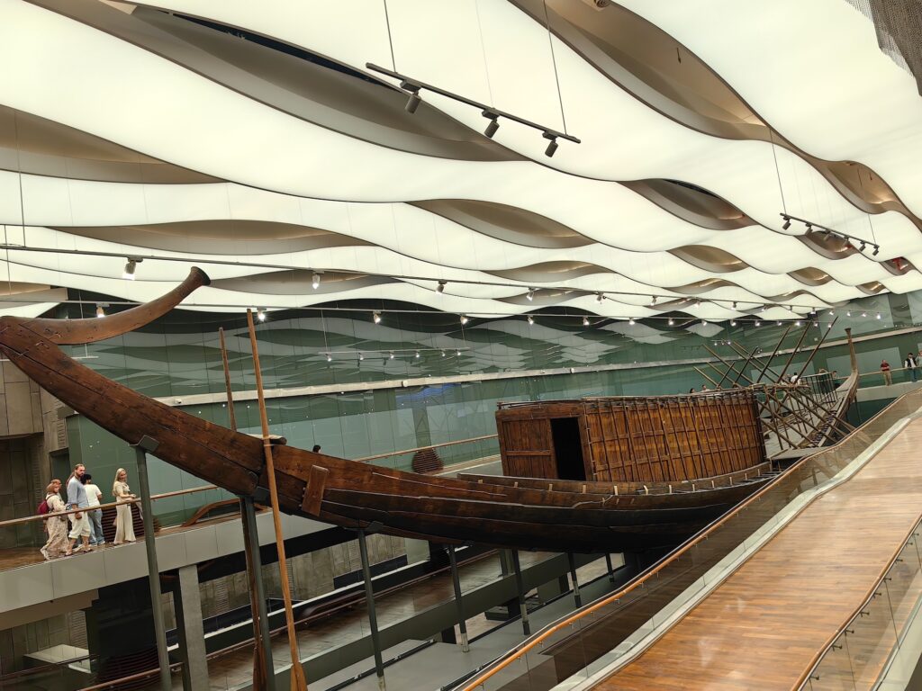 Khufu's Afterlife Ship (The Solar Barge) displayed inside the Grand Egyptian Museum, Giza