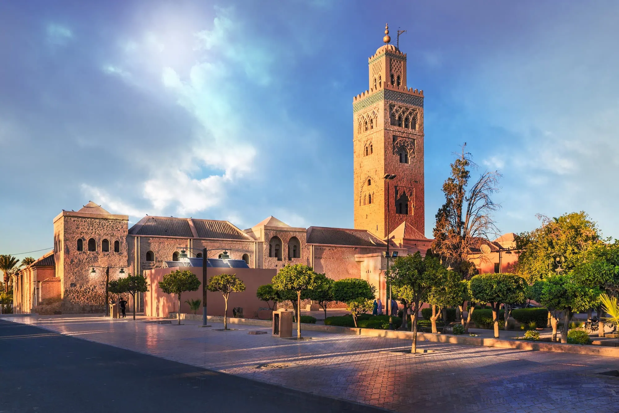 Koutoubia Mosque's 77-meter tall minaret towering over the medina plaza in Marrakech