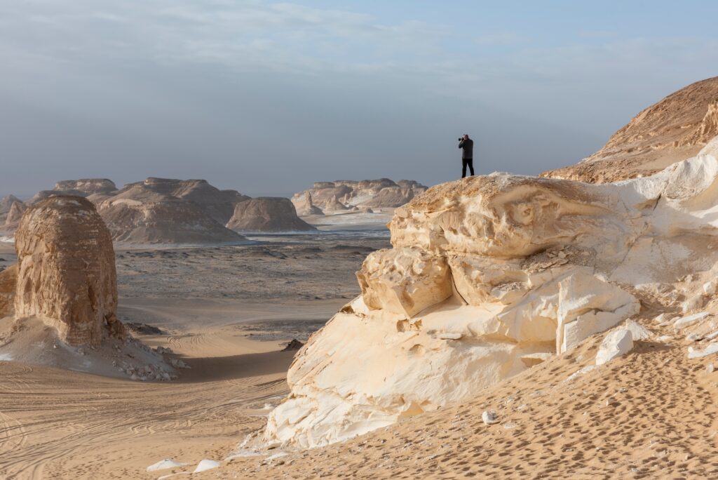 Landscape scenic view of desolate barren western desert in Egypt Valley of Agabat Obstacles at Farafra Oasis with geological rock formations