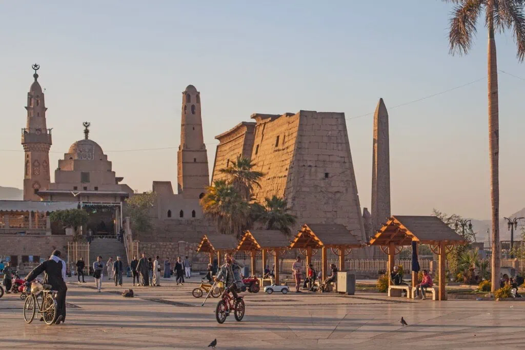 General view of Luxor Temple and Abu al-Haggag Mosque overlooking Luxor Temple Square at sunset, Luxor