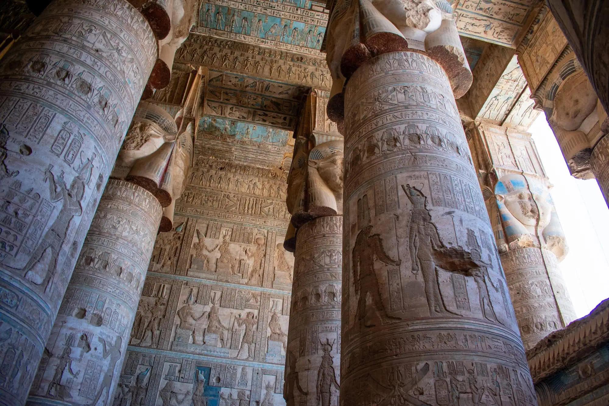Ornate ceiling paintings and hieroglyphic reliefs at Dendera Temple Complex