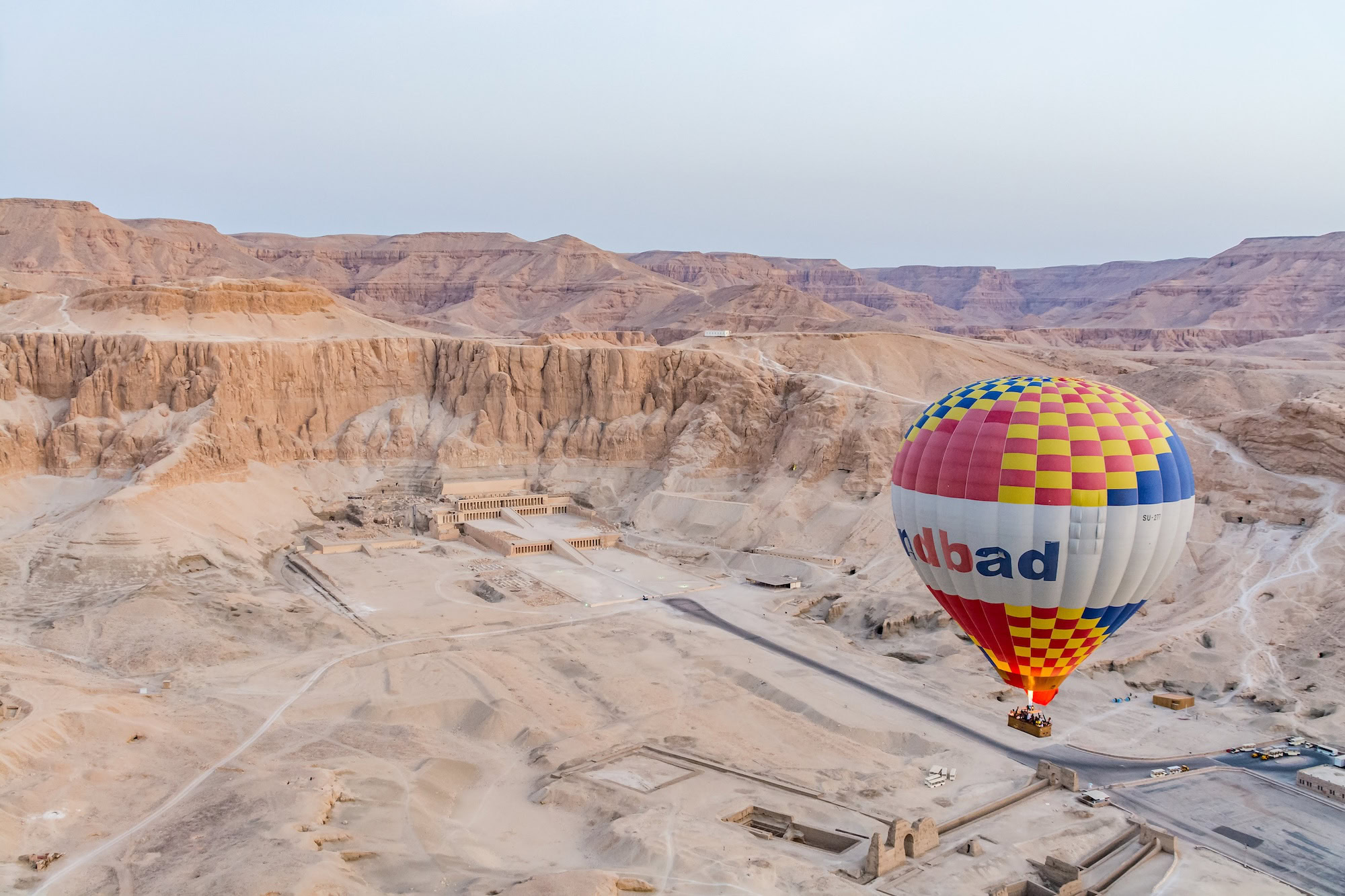 Hot air balloon floating above Hatshepsut Temple