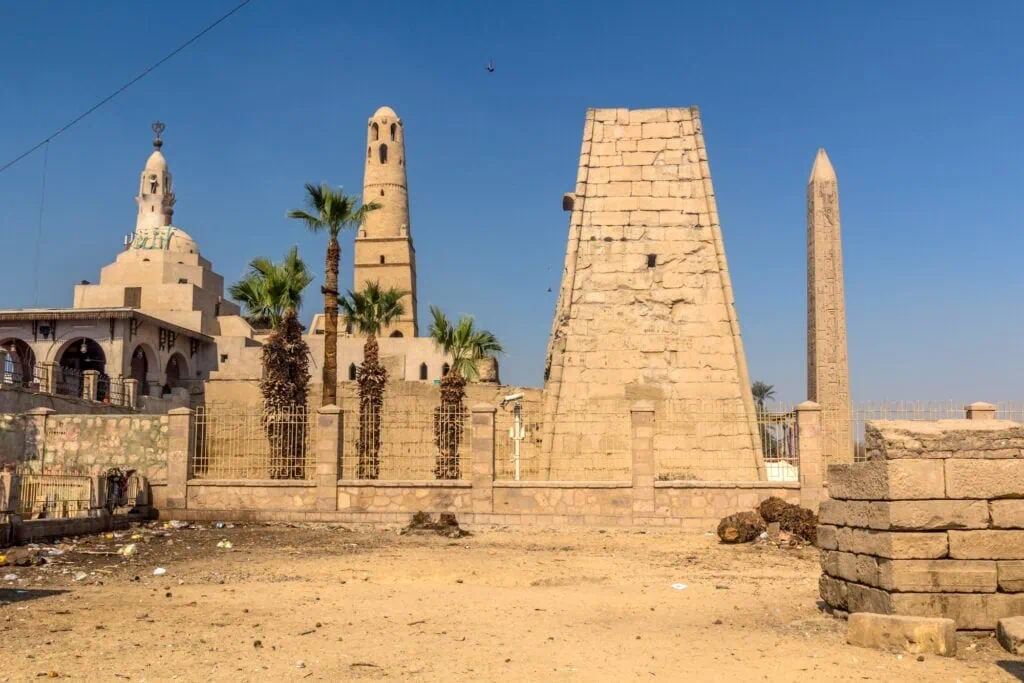 Luxor Temple pylon with the Abu Haggag Mosque rising above the ancient stone structure, Luxor