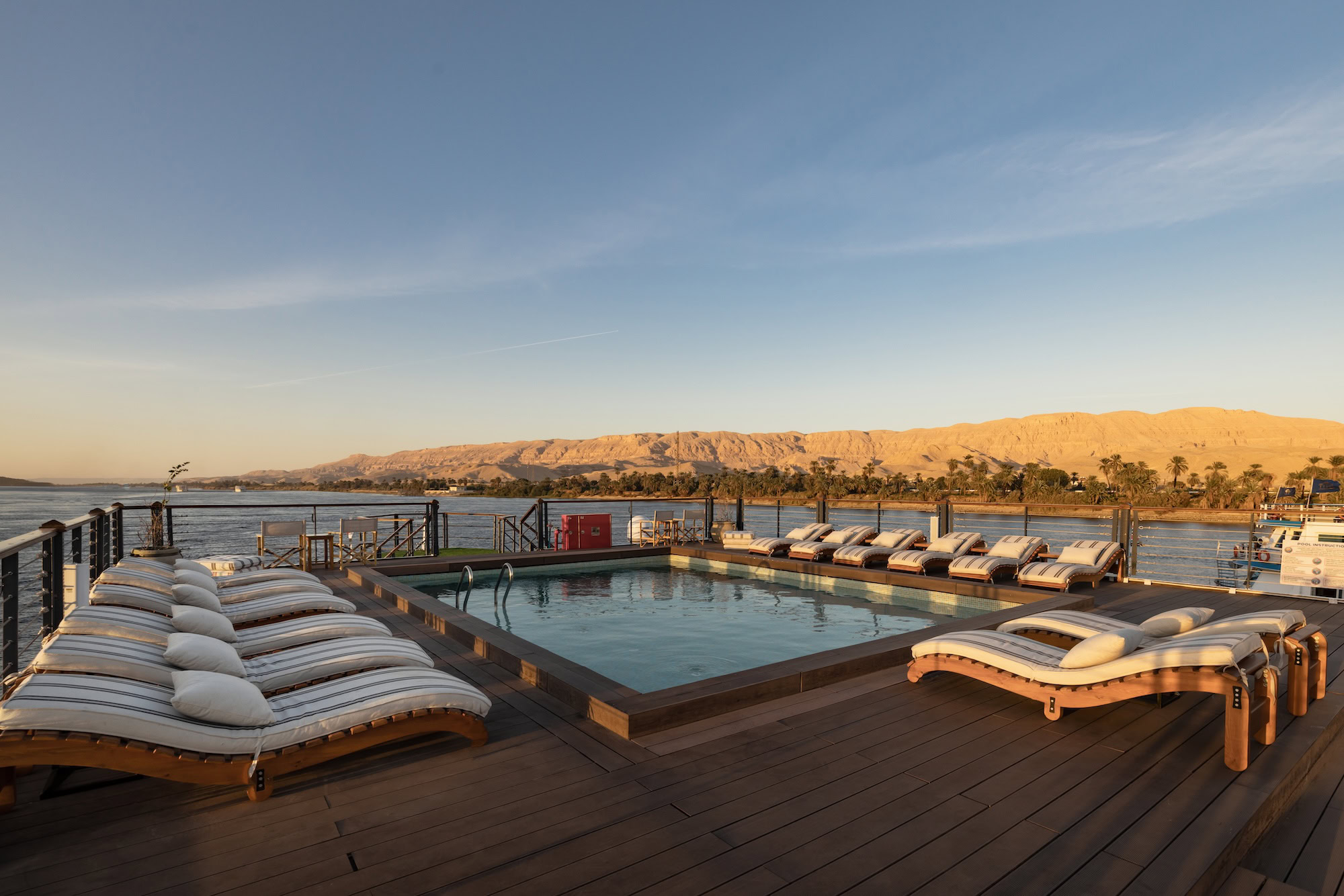 Outdoor pool on DWA Nile Cruise sun deck with loungers