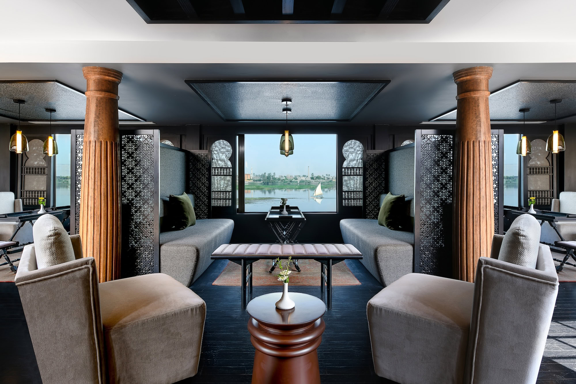 Elegant Nile cruise ship lounge with comfortable seating and river views