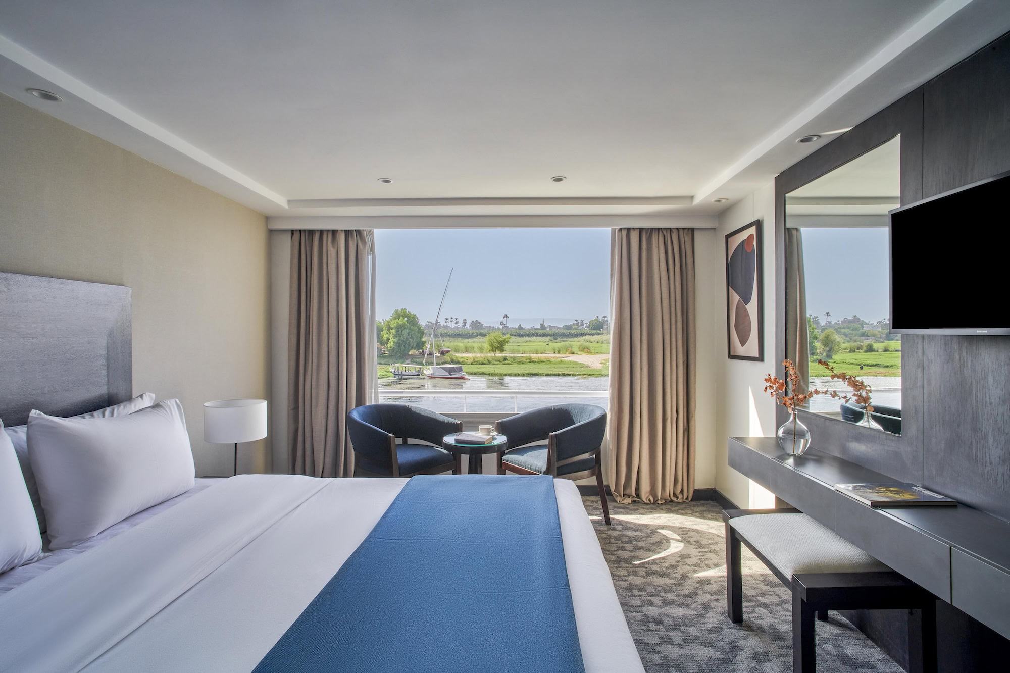 Comfortable cabin on Mövenpick Royal Lily with soft tones