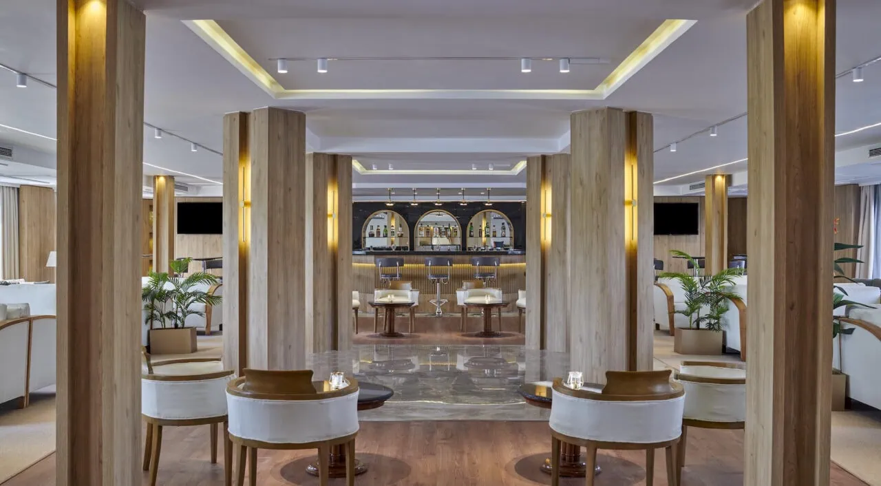 Indoor bar on Mövenpick MS Royal Lotus with warm lighting