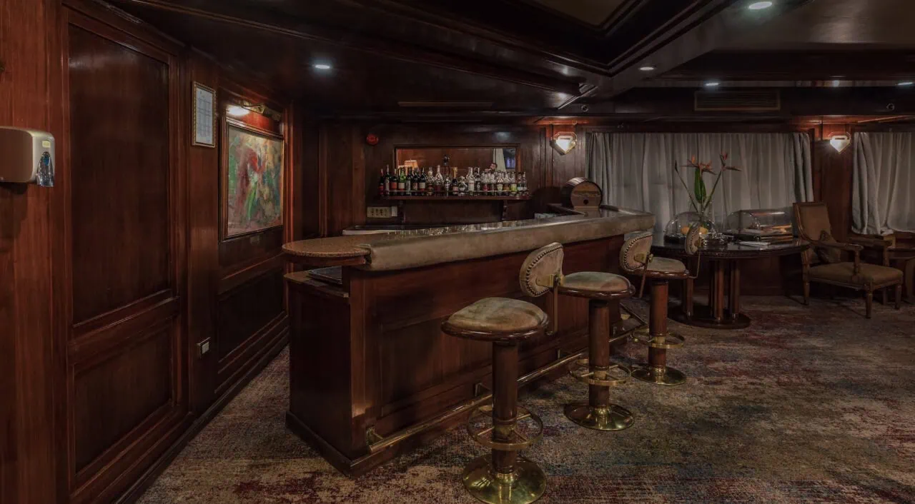 Stylish bar on MS Salacia with warm lighting and comfortable seating