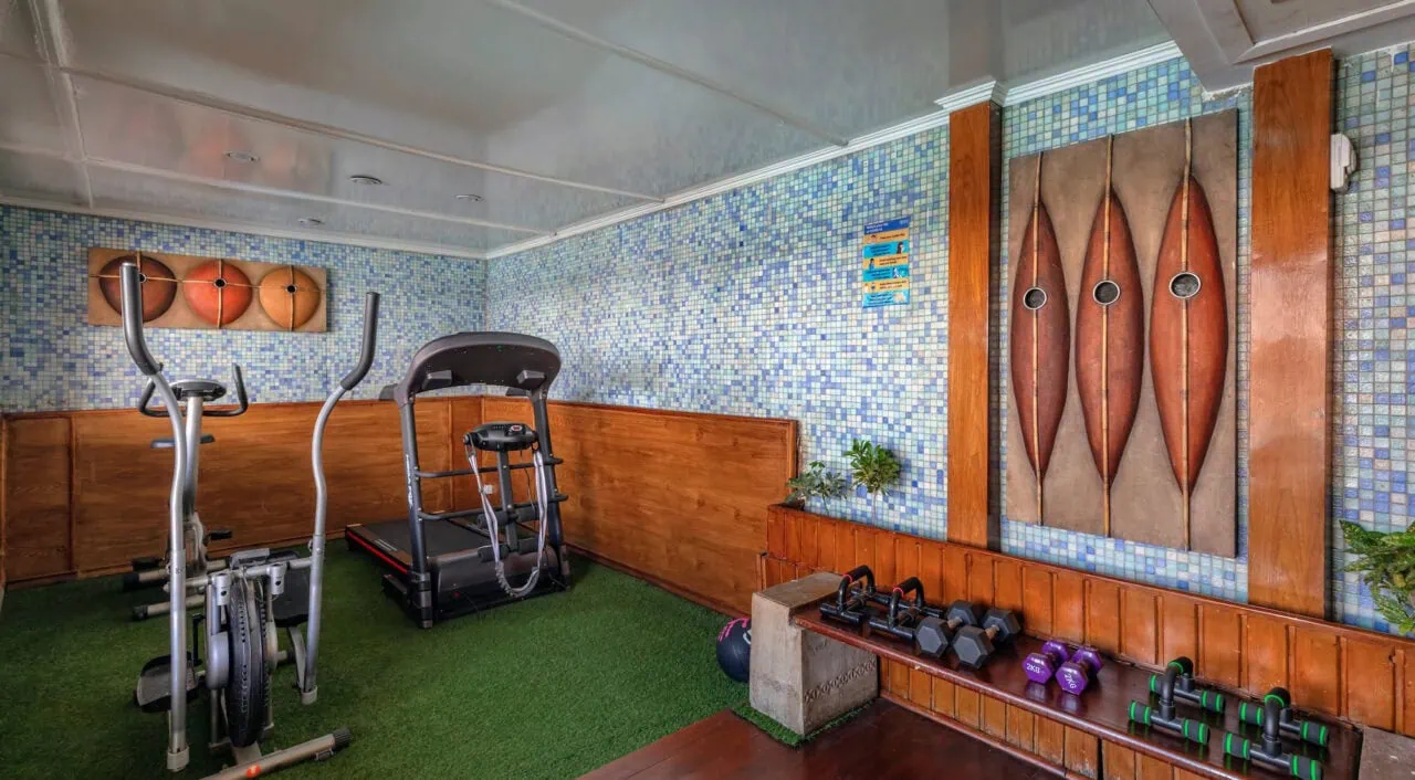 Fitness room on MS Salacia with gym equipment